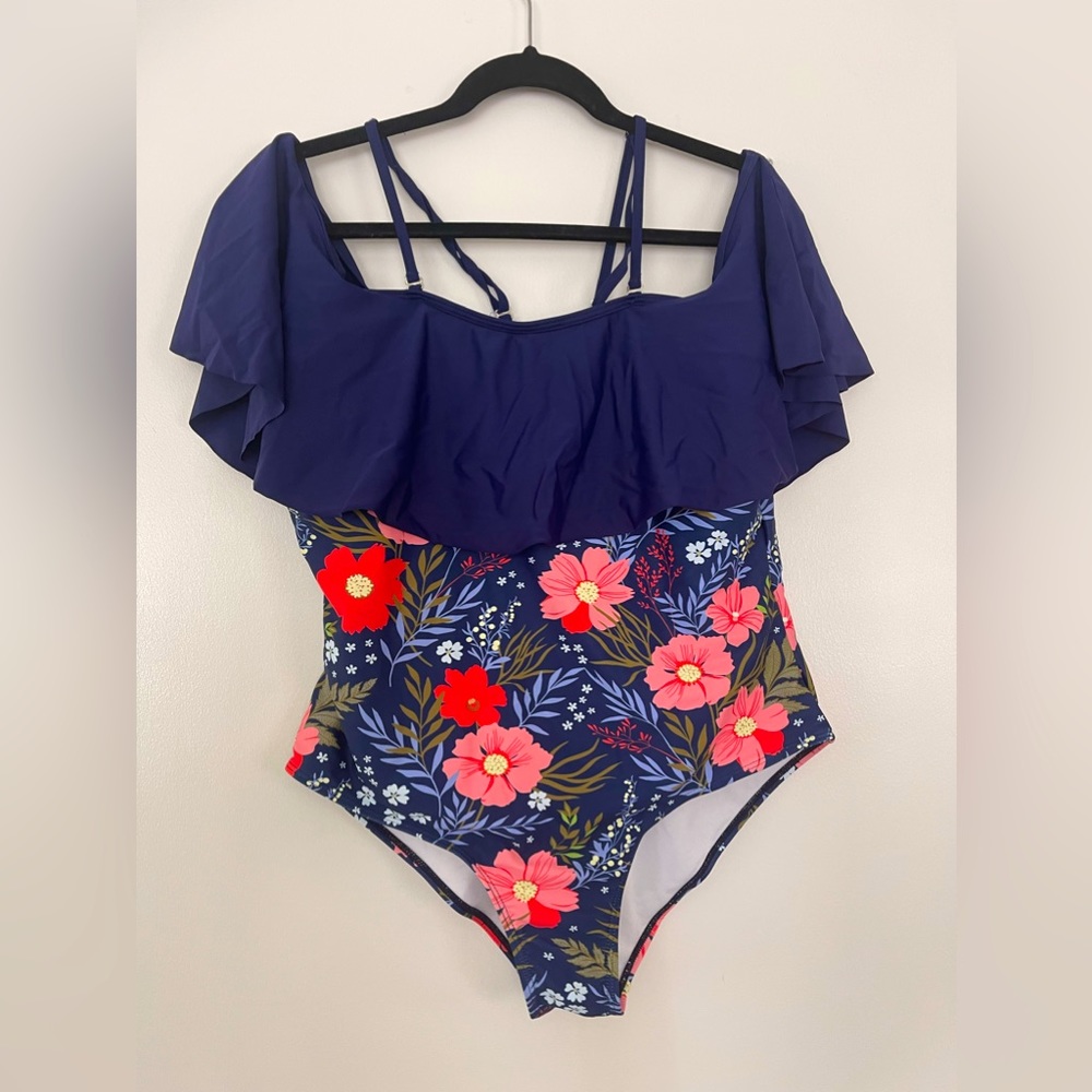 Navy blue ruched shoulder one-piece swimsuit with floral print. Size 0XL